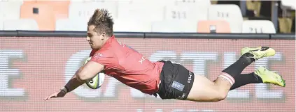  ?? Picture: Gallo Images ?? GAME-BREAKER. Lions centre Rohan Janse van Rensburg dives over to score the winning try in their Super Rugby opener against the Cheetahs in Blomefonte­in on Saturday.