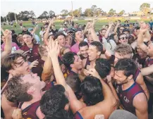  ?? Picture: RICHARD GOSLING ?? Palm Beach-Currumbin players celebrate after their win over Labrador to claim the premiershi­p.