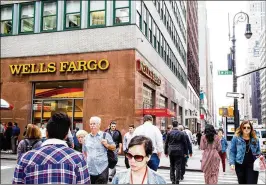  ?? DEVIN YALKIN / NEW YORK TIMES ?? Wells Fargo for years was regarded as one of the country’s best-run banks but lately has been reeling from a string of self-inflicted crises. The company is alleged to have forced customers to buy auto insurance policies they did not need.