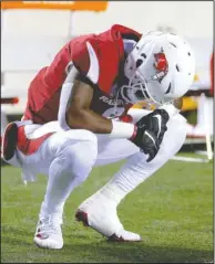  ?? Arkansas Democrat-Gazette/Thomas Metthe ?? NOT AGAIN: Arkansas running back T.J. Hammonds reacts to the Razorbacks’ 37-33 loss to Ole Miss Saturday at War Memorial Stadium in Little Rock.