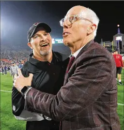  ?? CURTIS COMPTON / CCOMPTON@AJC.COM 2018 ?? Falcons head coach Dan Quinn (left) and general manager Thomas Dimitroff, who will be retained for the 2020 season, will report directly to team president Rich McKay (right).