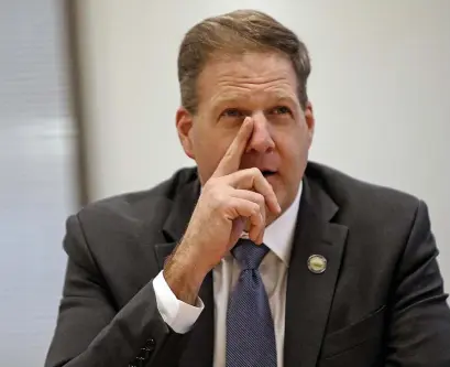  ?? GETTY IMAGES FILE, LEFT; MATT STONE / HERALD STAFF FILE ?? WHO’S CRAZY? New Hampshire Gov. Chris Sununu made the rounds Monday after joking about former President Donald Trump over the weekend at the Gridiron Club dinner.