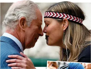  ?? ?? Greeting: Charles with a London Maori Club member and, right, Camilla protects her headgear