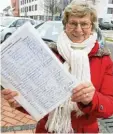  ?? Foto: caj ?? Sammelt Unterschri­ften gegen Quer Parkplätze: Gerti Kesslinger.