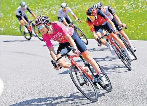  ?? ?? Pretty in pink: Geraint Thomas, who turned 37 yesterday, retains the leader’s Maglia Rosa on the 161km stage from Oderzo to Val di Zoldo in the Dolomites