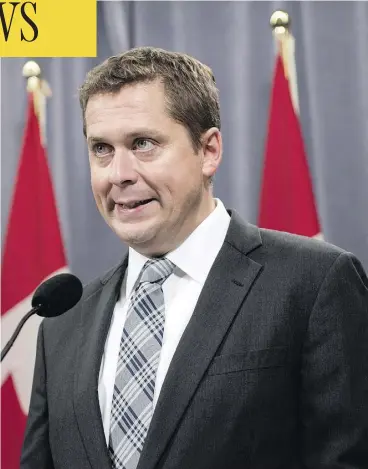  ?? DARREN CALABRESE / THE CANADIAN PRESS ?? Leader Andrew Scheer met the media in Halifax Thursday at the Conservati­ve national convention, where he blasted his former rival, Maxime Bernier, for leaving the party.