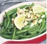  ?? KARON LIU/TORONTO STAR ?? You can freeze blinis made ahead of time and warm them up before serving. Clams steamed in a buttery, slightly peppery sauce then tossed with linguine impress. Green beans are in season.