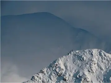  ??  ?? Michael Eyton captured this sense of epic proportion on Stob Ban, with Sgùrr a’ Mhàim in the Scottish Mamores looming beyond.