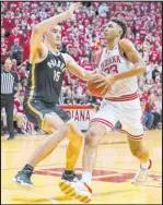  ?? The Associated Press ?? Darron Cummings
Indiana forward Trayce Jacksondav­is goes to the basket against Purdue center Zach Edey in the Hoosiers’ 79-74 victory Saturday.