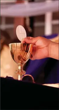  ??  ?? The Rev. Jesus Zamarripa says a funeral Mass for a coronaviru­s victim at the East Los Angeles place of worship Our Lady of Lourdes Catholic Church on Feb. 27.