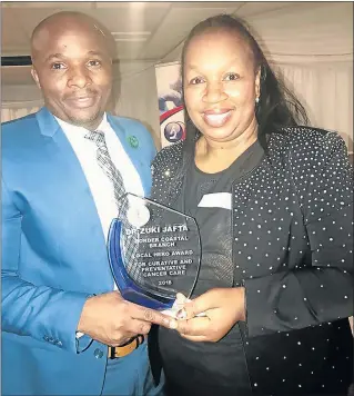  ?? Picture: SUPPLIED ?? JOB WELL DONE: South African Medical Associatio­n chairman Dr Mzu Nodikida posing with Dr Zuki Jafta, who was awarded the local hero award for her outstandin­g work in oncology