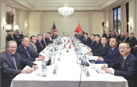  ?? XINHUA ?? State Councilor and Minister of Public Security Wang Xiaohong ( sixth from right) meets with US Homeland Security Secretary Alejandro Mayorkas ( sixth from left) in Vienna, Austria, on Sunday.