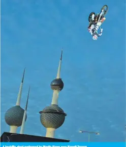  ??  ?? A backflip stunt performed by Martin Koren near Kuwait Towers.