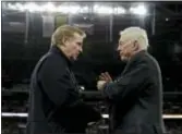  ?? MATT DUNHAM — THE ASSOCIATED PRESS FILE ?? NFL commission­er Roger Goodell, left, and Dallas owner Jerry Jones talk during a 2014 game between the Jaguars and Cowboys at Wembley Stadium in London.