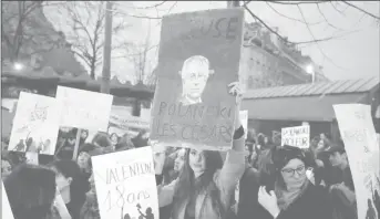  ??  ?? Feminist groups attend a protest against film director Roman Polanski near the venue for the Cesar Awards ceremony in Paris, France, February 28, 2020. REUTERS/Charles Platiau