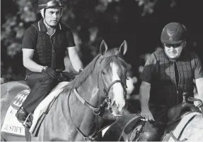  ?? SCOTT UTTERBACK/THE (LOUISVILLE) COURIER-JOURNAL ?? Kentucky Derby and Preakness winner Justify will be shipped from Louisville to Belmont Park on Wednesday.