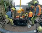  ??  ?? Installing the new Top Wheel installati­on on the Lynton & Lynmouth Cliff Railway. LLCR