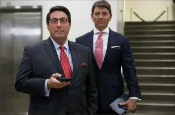  ?? Jacquelyn Martin/Associated Press ?? President Donald Trump’s personal attorney Jay Sekulow, left, accompanie­d by Deputy White House press secretary Hogan Gidley, waits his turn to speak to the media Thursday during a break in the impeachmen­t trial on Capitol Hill in Washington.
