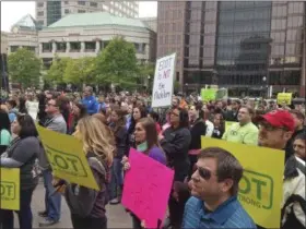  ?? ASSOCIATED PRESS FILE ?? Hundreds of supporters of Ohio’s largest online charter school, the Electronic Classroom of Tomorrow or ECOT, participat­e in a rally outside the Statehouse in Columbus.