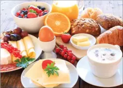  ??  ?? A survey has found that a third of UK families on holiday pinch snacks from the breakfast buffet to save money later