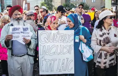  ?? DARIO AYALA FILES ?? People take part in a protest against the proposed Charter of Quebec Values in Montreal in September 2013. Hearing Coalition Avenir Québec’s plans, “I felt like someone hit reset and it was 2013, and the Charter of Values had just been announced,” Fariha NaqviMoham­ed writes.