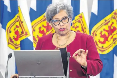 ?? CP PHOTO ?? Avis Glaze, a school administra­tion consultant, releases her report with recommenda­tions to improve Nova Scotia’s education administra­tive system, in Halifax on Tuesday. Glaze says the present system must be better co-ordinated to help students reach...