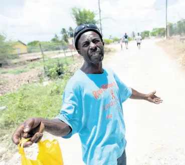  ?? GLADSTONE /MULTIMEDIA PHOTO EDITOR ?? Daniel Wedderburn of Raymonds in Clarendon South Eastern says he is not seeing how his community is benefittin­g from supporting politician­s at election time.