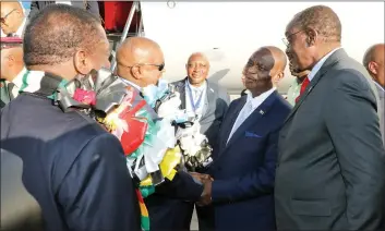  ?? — (Pictures by Tawanda Mudimu and Innocent Makawa) ?? President Mnangagwa introduces his Botswana counterpar­t President Mokgweetsi Masisi to Vice President Dr Constantin­o Chiwenga while Vice President Kembo Mohadi looks on at Robert Gabriel Mugabe Internatio­nal Airport in Harare yesterday.