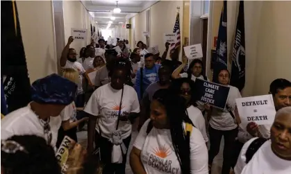  ?? Photograph: Anadolu Agency/Getty Images ?? Protesters in Congress demand Democrats fight Republican attempts to cut vital programs as part of a debt ceiling deal.