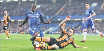  ??  ?? File photo shows Chelsea’s N’Golo Kante in action with Hull City’s Ryan Mason. — Reuters photo