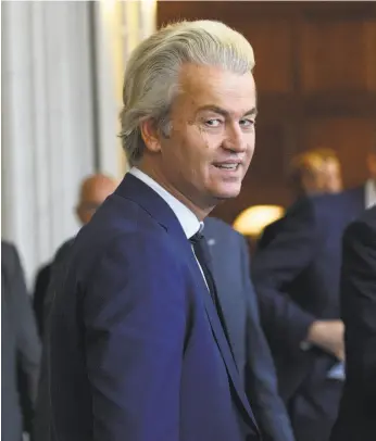  ?? Carl Court / Getty Images ?? Geert Wilders, leader of a far-right, anti-immigrant political party in the Netherland­s, finished a distant second in Dutch national elections.