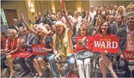  ?? MICHAEL CHOW/THE REPUBLIC ?? Supporters cheer during Kelli Ward’s Senate campaign kickoff event at the Hilton Scottsdale Resort on Tuesday.
