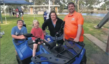  ?? ?? PUMPED: Charee Chaplin, with her children Sam, 12, and Hayley, 8, and Horsham Fishing Competitio­n committee member Karl Carman, celebrates her first-prize win at the weekend’s event. Below, Zack and Sophia Pickering with a carp. Pictures: PAUL CARRACHER