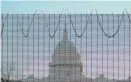  ?? J. SCOTT APPLEWHITE/ASSOCIATED PRESS ?? Fencing and razor wire surround the perimeter of the Capitol in Washinton on Thursday.