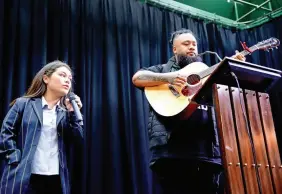  ??  ?? BOTTOM / Matt and his daughter, Oceana, perform a song before a high school award ceremony that Matt had attended as the guest speaker, in a display of familial solidarity.