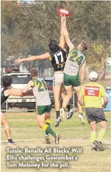  ?? ?? Tussle: Benalla All Blacks’ Will Ellis challenges Goorambat’s Tom Moloney for the pill.