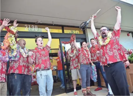  ??  ?? Trader Joe’s officially opened on Friday morning, drawing hundreds to the Germantown store’s unveiling. PHOTOS BY STAN CARROLL / THE COMMERCIAL APPEAL