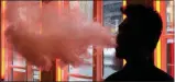  ?? FRANK FRANKLIN II- THE ASSOCIATED PRESS ?? In this Feb. 20, 2014, file photo, a patron exhales vapor from an e-cigarette at a store in New York. Commenting that “people should not be using vaping products, period,”