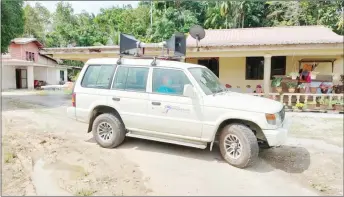  ?? — Photo by JaPen Sarawak ?? The IOW mobile vehicle unit hails the announceme­nts via speakers during a drive around a village in Lundu.