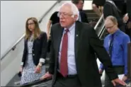  ?? JACQUELYN MARTIN — THE ASSOCIATED PRESS FILE ?? In this file photo, Sen. Bernie Sanders, I-Vt. rides an escalator on Capitol Hill in Washington. Republican­s are fending off questions about Russia and the Trump campaign, and dealing with an unpopular health care plan.