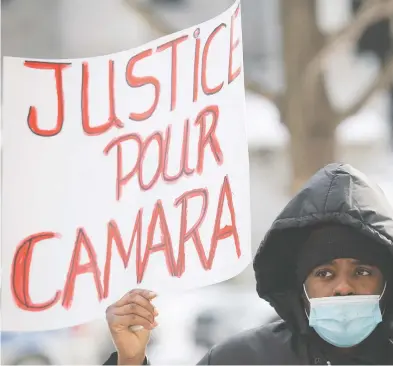  ?? GRAHAM HUGHES / THE CANADIAN PRESS ?? People attend a We Are All Camara protest in Montreal on Saturday, calling for justice for Mamadi III Fara Camara,
a man who was wrongfully arrested by police and jailed for six days.