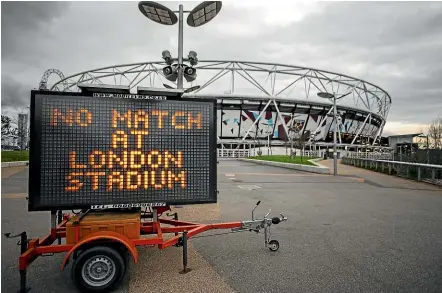  ?? GETTY IMAGES ?? London Stadium, home of West Ham United, was closed at the weekend as the Premier League shut down until April 3 but it appears likely that Jurgen Klopp, below, and his Liverpool team will become champions.