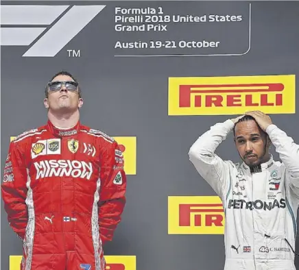 ??  ?? Lewis Hamilton subió al podio como tercero y su alirón como campeón del mundo deberá aplazarse al próximo Gran Premio// AFP