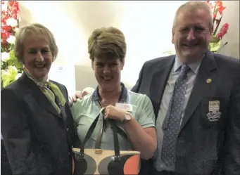  ??  ?? Rita Black, overall winner of the Captain’s Prize to the Ladies at Ardee GC, is congratula­ted by Lady Captain Maureen Duffy and Captain Ken McKeever.