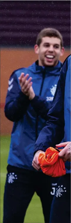  ??  ?? Kyle Lafferty jokes around with Jon Flanagan in training yesterday ahead of tomorrow’s Hamilton game