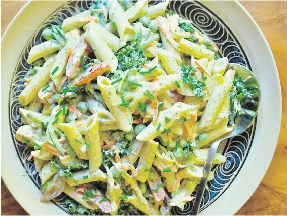  ??  ?? Green Goddess Pasta and Vegetable Salad is flavoured with a rich and tangy dressing.