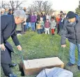  ?? ?? Jersey residents lay Henry Percy, their unoffical mascot, to rest in Grouville