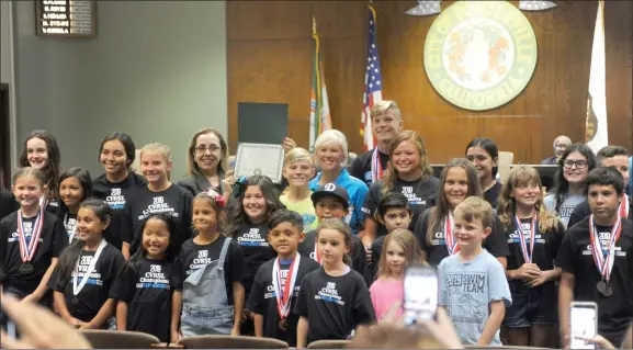  ?? RECORDER PHOTO BY NAYIRAH DOSU ?? The Portervill­e Neptunites were recognized for winning the Central Valley Recreation­al Swim League Championsh­ip by the Portervill­e City Council on Tuesday, August 6, 2019, at City Hall.