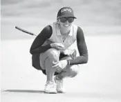  ?? CHRIS CARLSON/AP ?? Pernilla Lindberg lines up her putt on the first hole during the third round of the LPGA Tour ANA Inspiratio­n golf tournament.