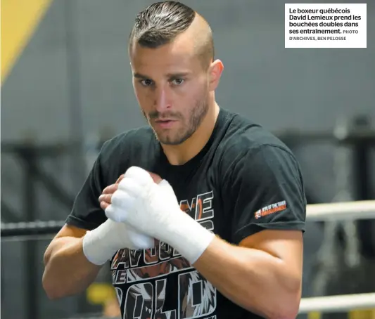  ?? PHOTO D’ARCHIVES, BEN PELOSSE ?? Le boxeur québécois David Lemieux prend les bouchées doubles dans ses entraîneme­nt.